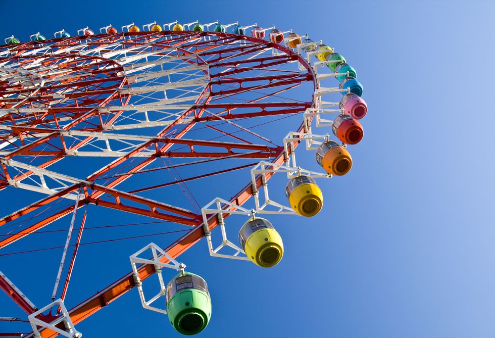 Ferris wheel, Amusement ride, Tourist attraction, Amusement park, Recreation, Sky, Fun, Leisure, Nonbuilding structure, Circle, 