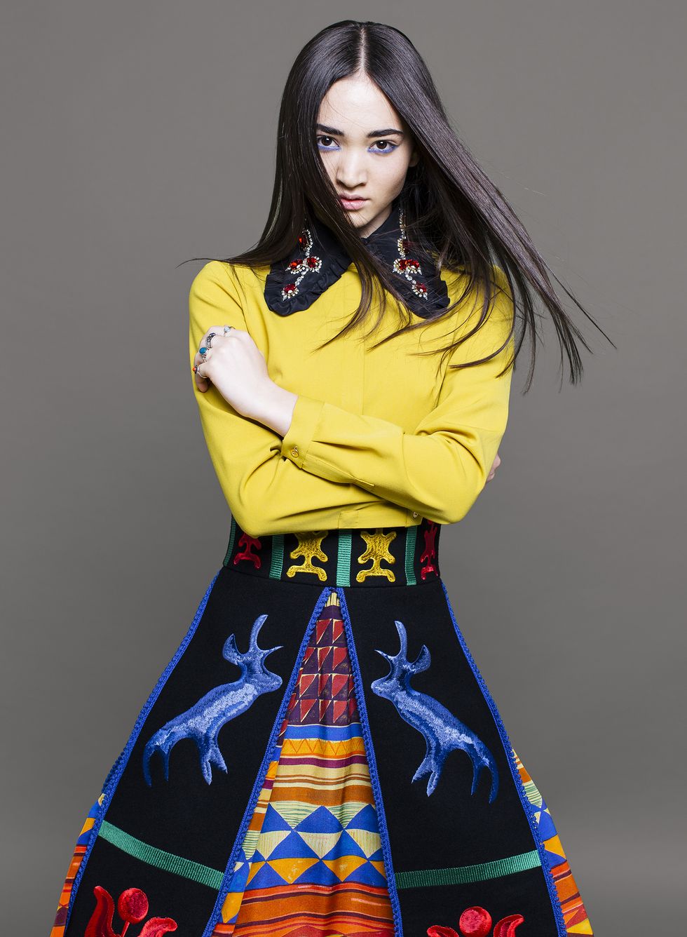 Hairstyle, Yellow, Sleeve, Style, Waist, Fashion, Art, Long hair, Fashion model, Black hair, 