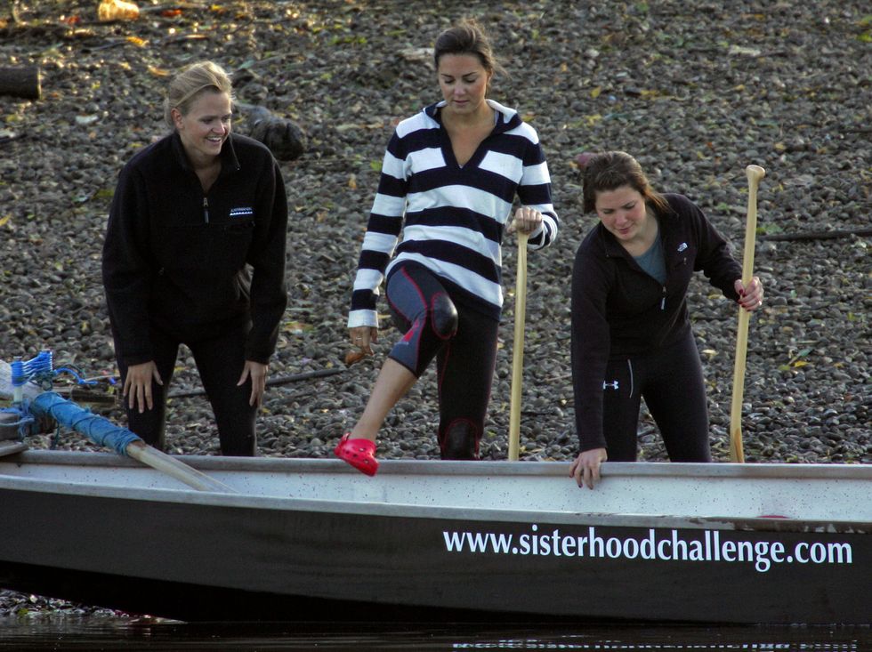 LONDON, UNITED KINGDOM - JULY 07:  Emma Sayle (left) and Kate Middleton (centre) take part in a training session with the Sisterhood cross Channel rowing team, on the River Thames on July 27, 2007 in London, England.  (Photo by Indigo/Getty Images)