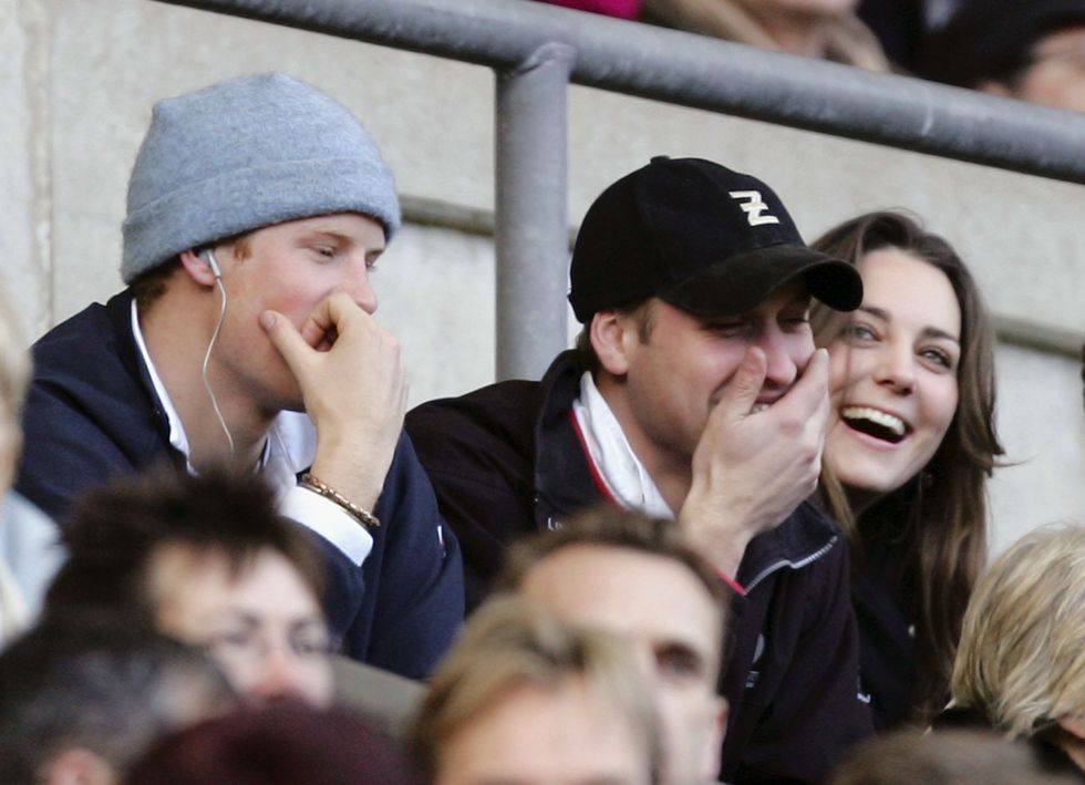 LONDON - FEBRUARY 10:  Prince Harry (L) and Prince William (C) and Kate Middleton (R) watch the action during the RBS Six Nations Championship match between England and Italy at Twickenham on February 10, 2007 in London, England.  (Photo by Richard Heathcote/Getty Images)