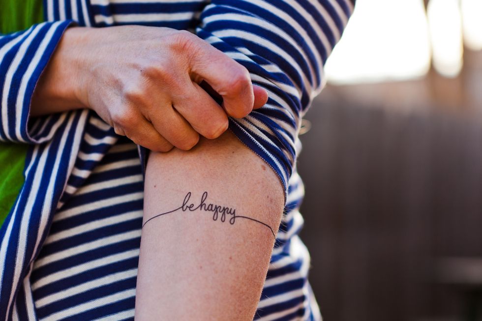Tatuaggio avanbraccio frase scritta