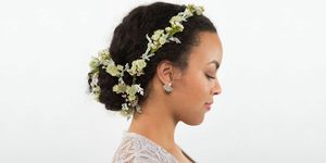 Clothing, Hairstyle, Yellow, Skin, Bridal accessory, Forehead, Petal, Eyebrow, Hair accessory, Photograph, 