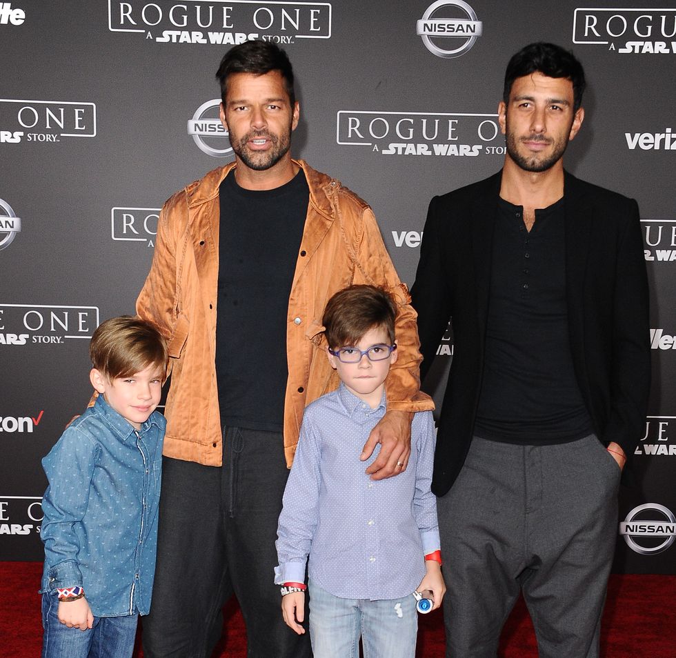 HOLLYWOOD, CA - DECEMBER 10:  Recording artist Ricky Martin (2nd L), artist Jwan Yosef (R), and sons Matteo Martin and Valentino Martin attend the premiere of 