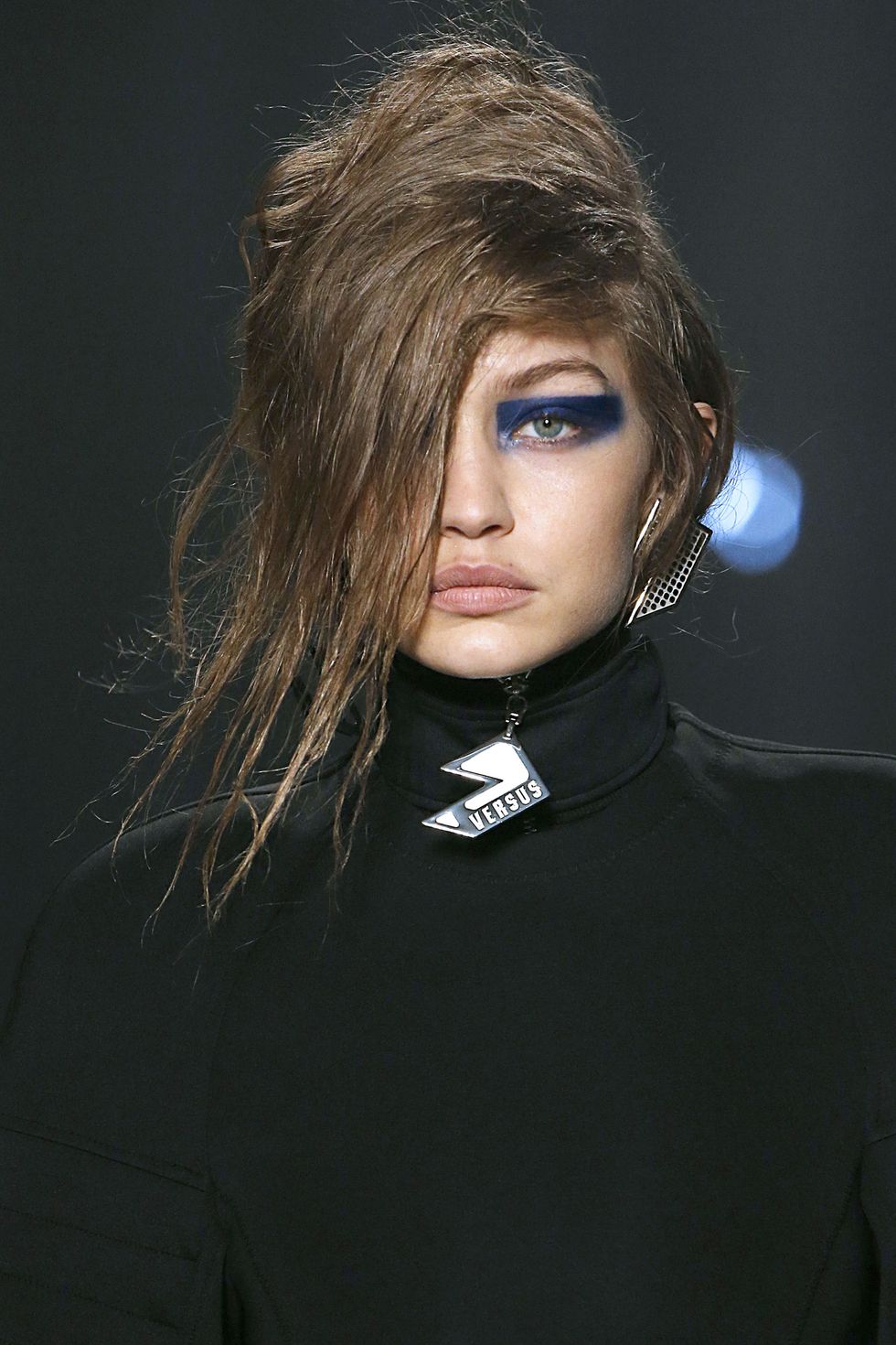 LONDON, ENGLAND - FEBRUARY 18: Gigi Hadid walks the runway at the VERSUS designed by Donatella Versace Ready to Wear Fall Winter 2017-2018 fashion show during the London Fashion Week February 2017 collections on February 18, 2017 in London, England. (Photo by Victor VIRGILE/Gamma-Rapho via Getty Images)