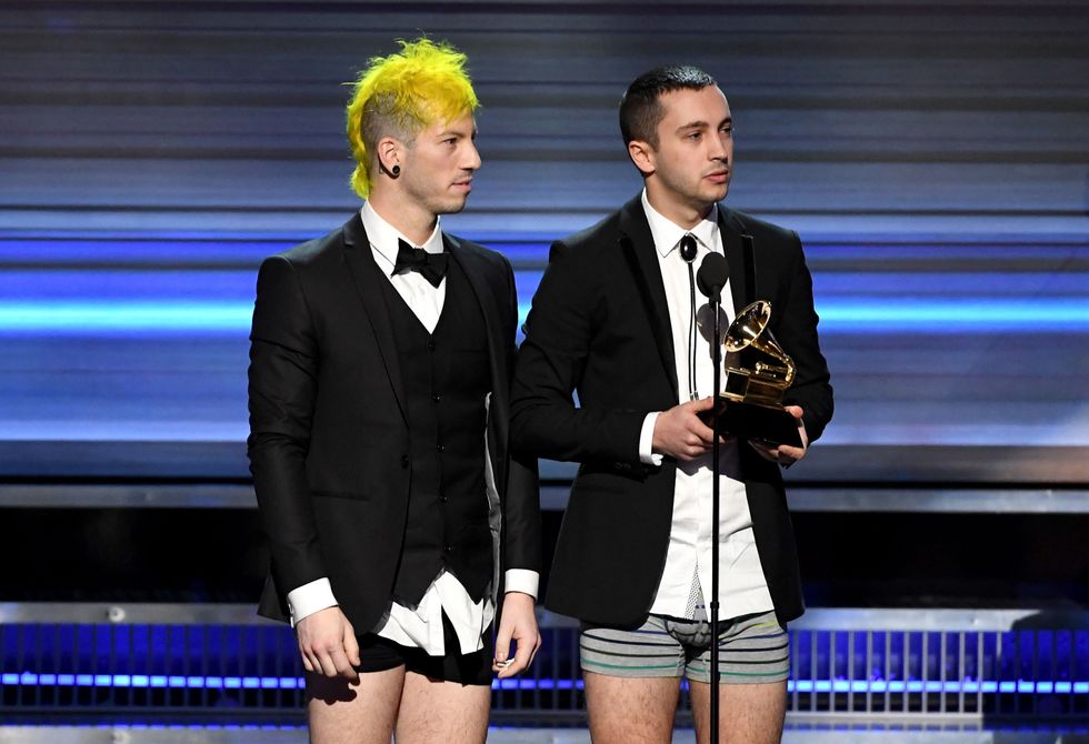 LOS ANGELES, CA - FEBRUARY 12:  Recording artists Josh Dun (L) and Tyler Joseph of music group Twenty One Pilots accept the Best Pop Duo/Group Performance award for 'Stressed Out' onstage during The 59th GRAMMY Awards at STAPLES Center on February 12, 2017 in Los Angeles, California.  (Photo by Kevin Winter/Getty Images for NARAS)