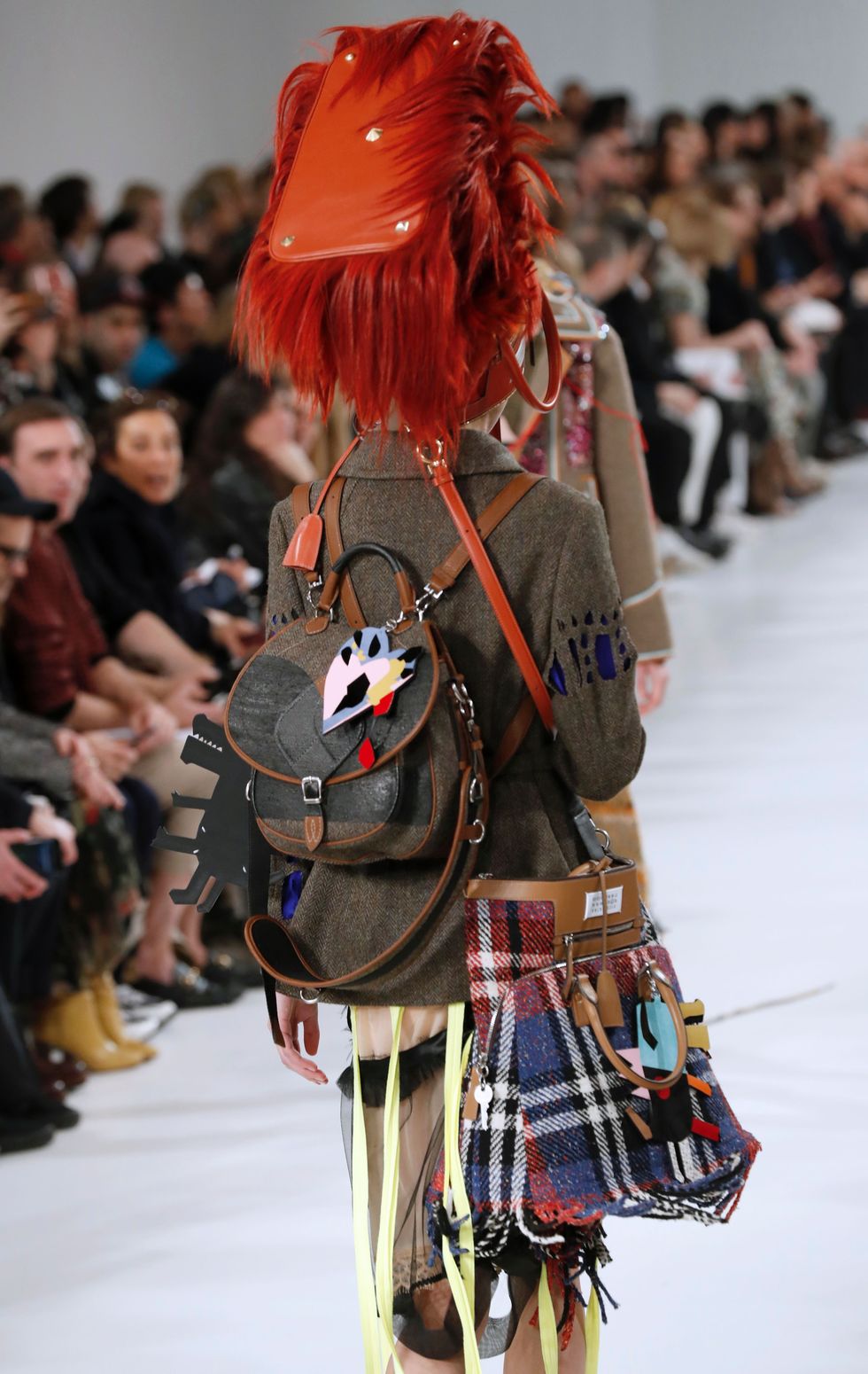 A model presents a creation by Maison Margiela during the women's Fall-Winter ready-to-wear collection fashion show in Paris on March 1, 2017. / AFP / FRANCOIS GUILLOT        (Photo credit should read FRANCOIS GUILLOT/AFP/Getty Images)