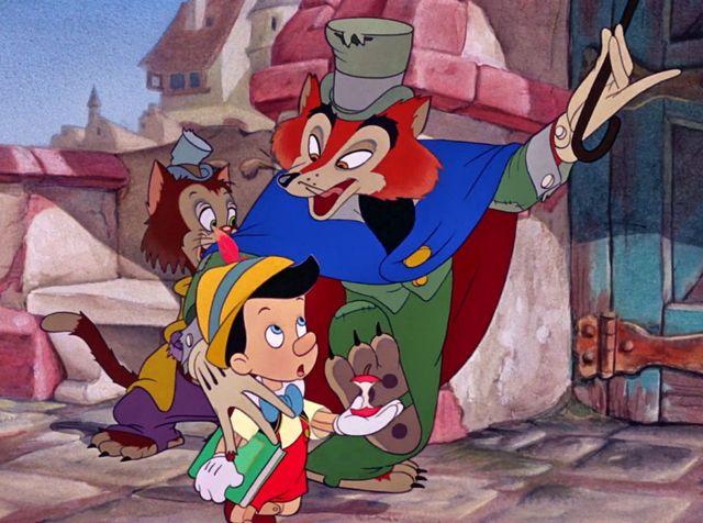 una scena del film d'animazione Disney di Pinocchio con il Gatto e la Volpe, due esempi di brutte persone