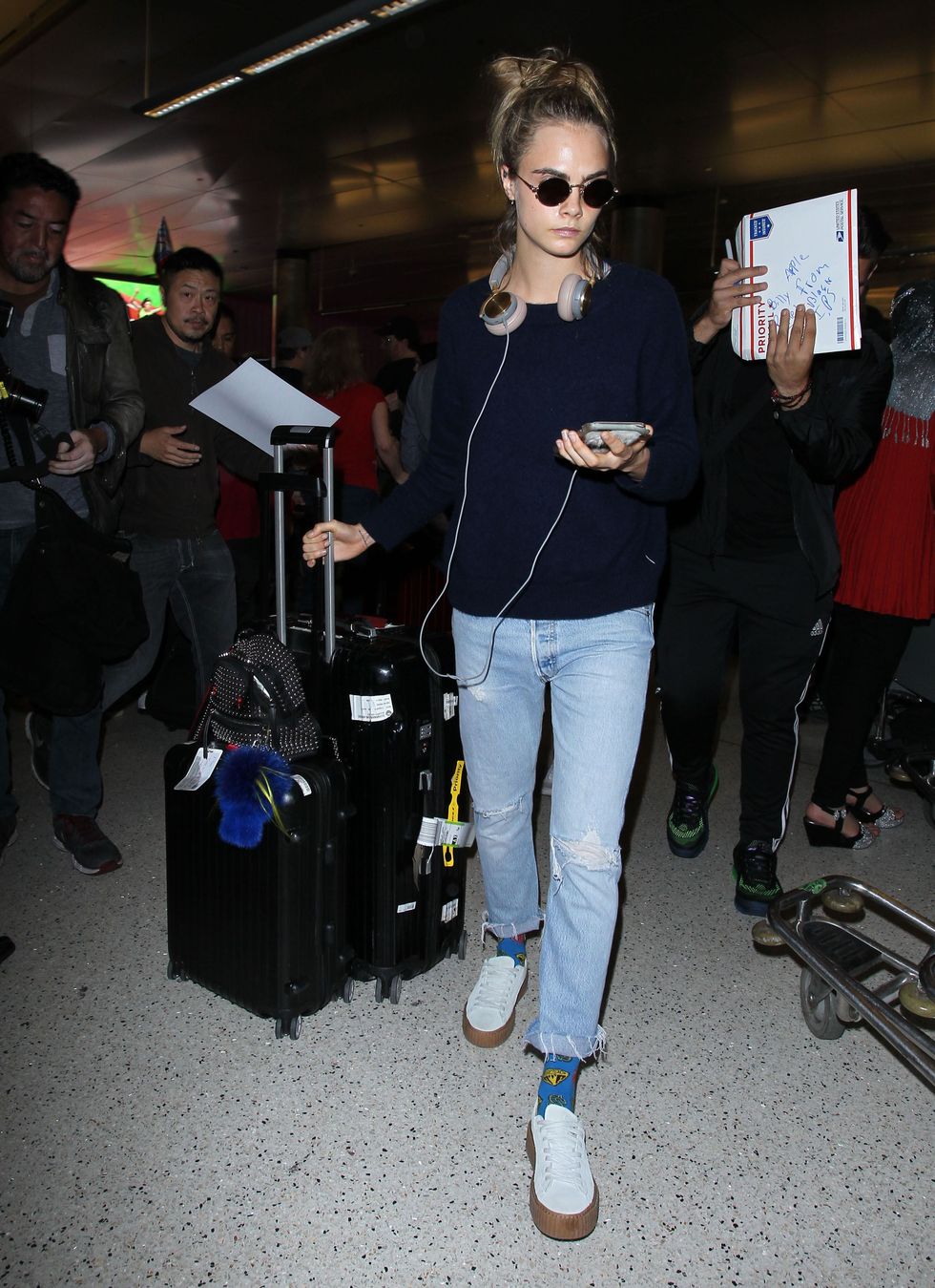 LOS ANGELES, CA - APRIL 08:  Fashion model Cara Delevingne is seen at Los Angeles International Airport (LAX) on April 8, 2016 in Los Angeles, California.  (Photo by SMXRF/Star Max/GC Images)
