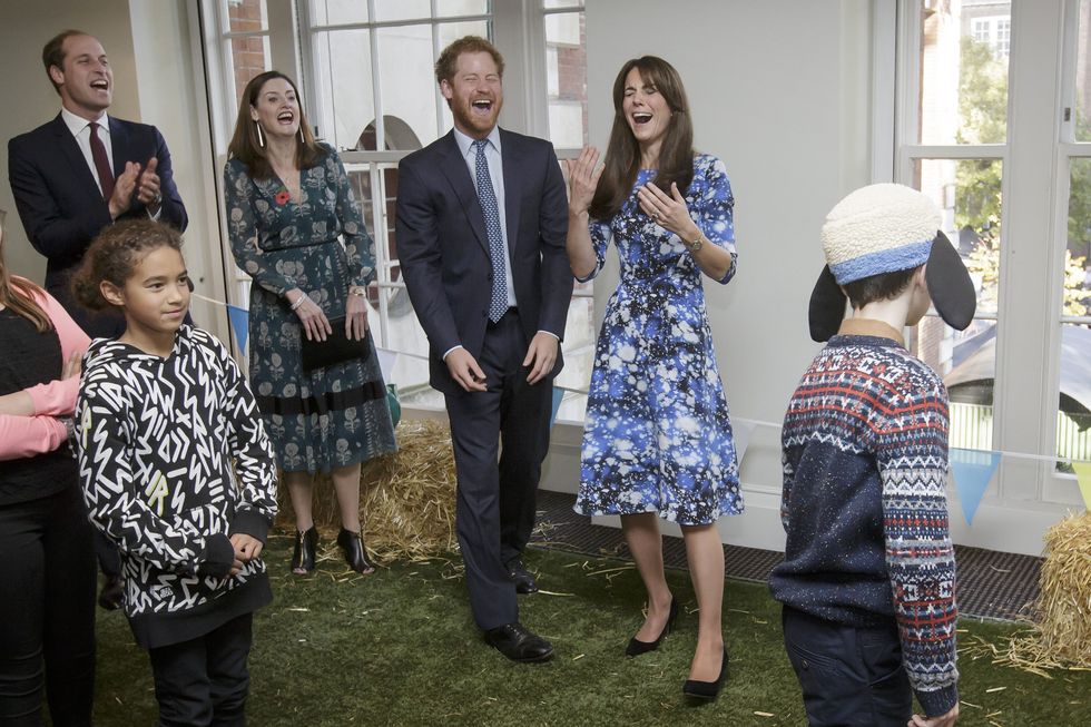 LONDON, UNITED KINGDOM - OCTOBER 26:  Prince William, Duke of Cambridge, left, Prince Harry, centre, and Catherine, Duchess of Cambridge, right, smile as they take part in 'welly wanging', with children and representatives from charities and Aardman Animations, during a meeting of the Charities Forum at BAFTA on October 26, 2015 in London, United Kingdom. (Photo by Tim Ireland - WPA Pool/Getty Images)