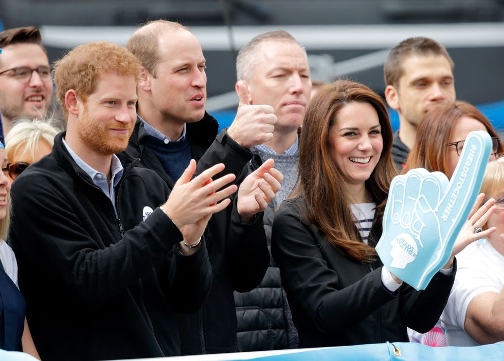 LONDON, UNITED KINGDOM - APRIL 23: (EMBARGOED FOR PUBLICATION IN UK NEWSPAPERS UNTIL 48 HOURS AFTER CREATE DATE AND TIME) Prince Harry, Prince William, Duke of Cambridge and Catherine, Duchess of Cambridge (wearing a giant foam hand) cheer on runners talking part in the 2017 Virgin Money London Marathon on April 23, 2017 in London, England. The Heads Together mental heath campaign, spearheaded by The Duke &amp; Duchess of Cambridge and Prince Harry, is the marathon's 2017 Charity of the Year. (Photo by Max Mumby/Indigo/Getty Images)