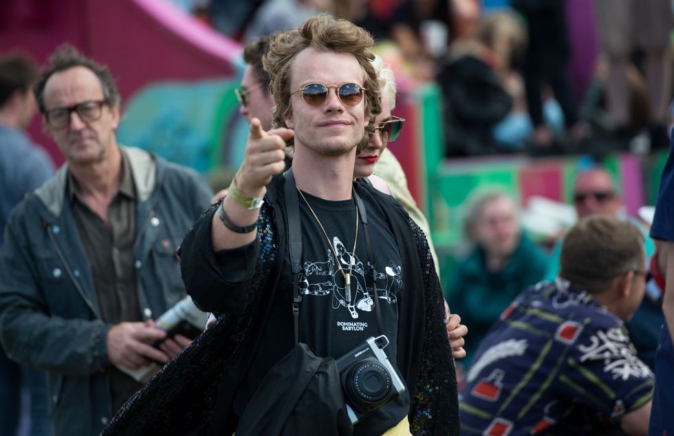 GLASTONBURY, ENGLAND - JUNE 25:  Actor Alfie Allen is seen at Glastonbury Festival Site on June 25, 2017 in Glastonbury, England. As Glastonbury Festival 2017 comes to its final day many revellers find themselves struggling after a long weekend of partying. Glastonbury Festival of Contemporary Performing Arts is the largest greenfield festival in the world and will return in 2019 after having a fallow year in 2018 to allow the land to recover.  (Photo by Chris J Ratcliffe/Getty Images)
