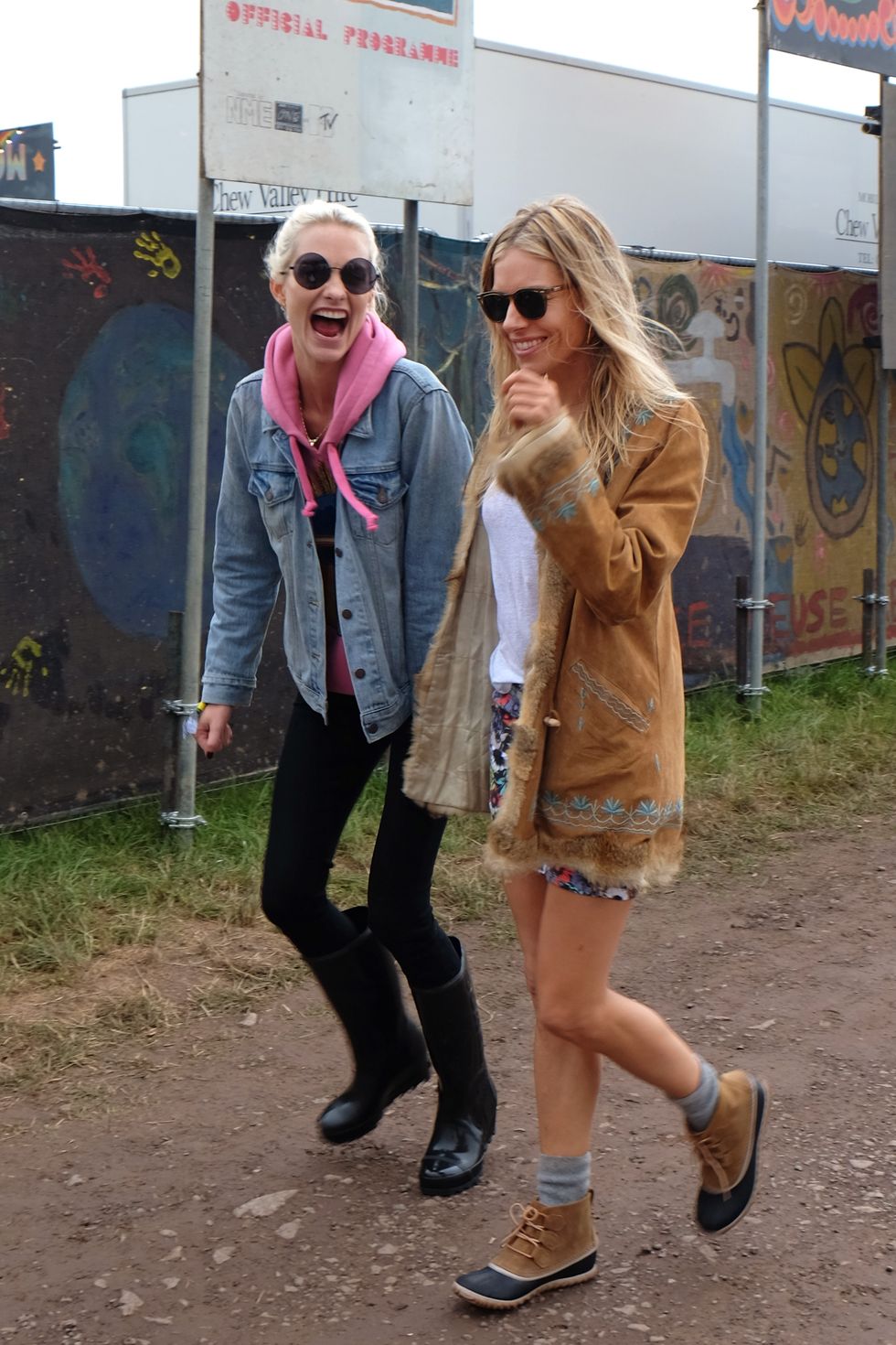 GLASTONBURY, ENGLAND - JUNE 24:  Poppy Delevingne (L) and Sienna Miller attend day 2 of the Glastonbury Festvial on June 24, 2017 in Glastonbury, England.  (Photo by Mark Boland#2017-2018/Getty Images)