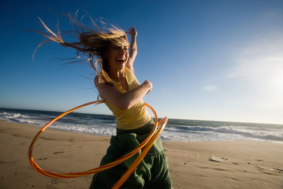 esercizi addominali con hula hoop