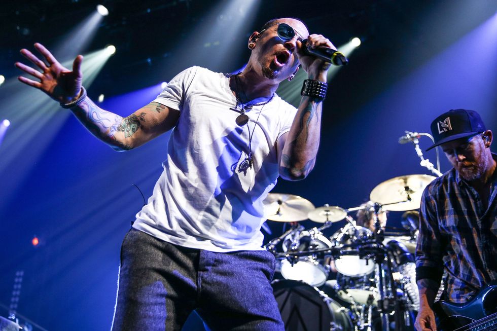 BURBANK, CA - MAY 22:  (L-R) Chester Bennington, Rob Bourdon and Dave Farrell of Linkin Park perform on stage at the iHeartRadio Album Release Party presented by State Farm at the iHeartRadio Theater Los Angeles on May 22, 2017 in Burbank, California.  (Photo by Rich Fury/Getty Images for iHeartMedia)