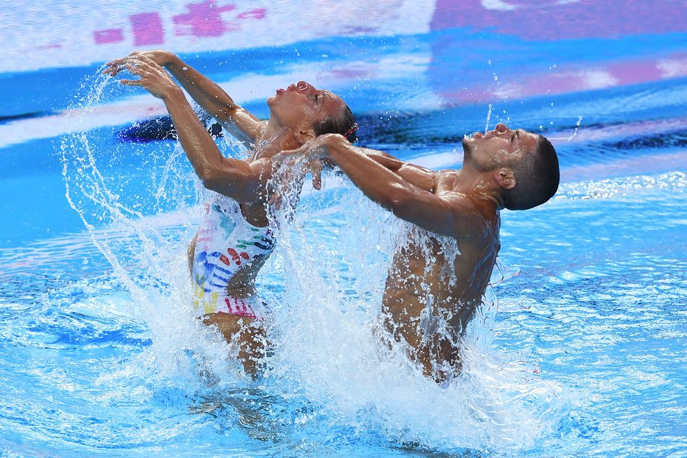 BUDAPEST, HUNGARY - JULY 15:  Manila Flamini of Italy and Giorgio Minisini of Italy competes during the Mixed Duet Synchro Technical, Preliminary Round on day two of the Budapest 2017 FINA World Championships on July 15, 2017 in Budapest, Hungary.  (Photo by Laurence Griffiths/Getty Images)