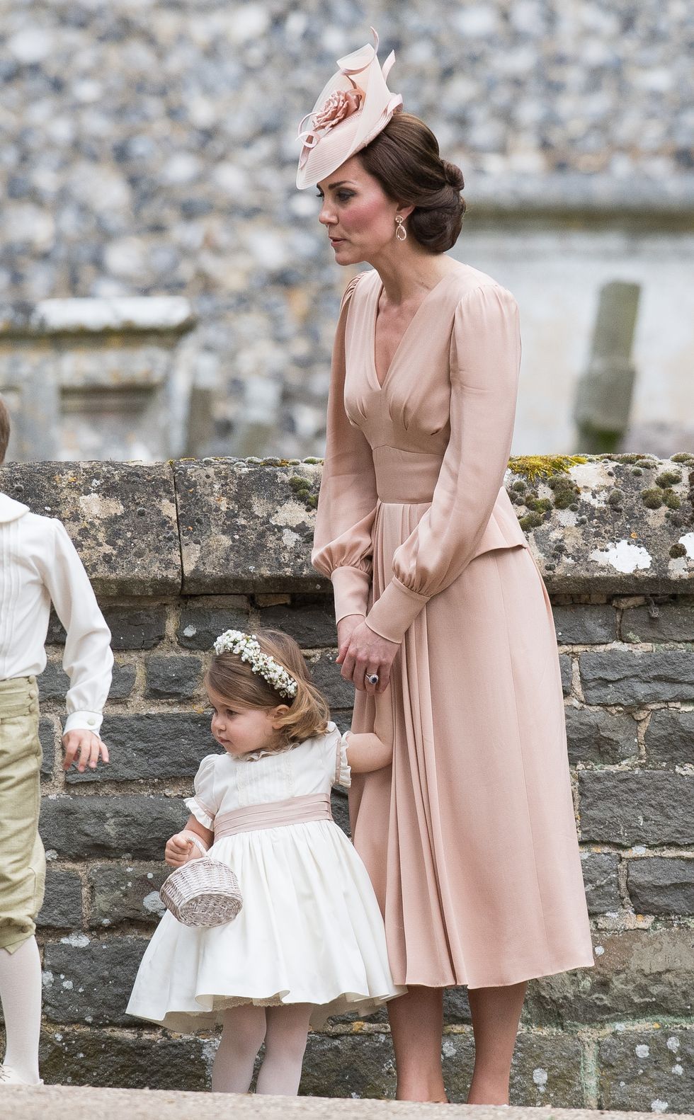 ENGLEFIELD GREEN, ENGLAND - MAY 20:  Princess Charlotte of Cambridge, bridesmaid and Catherine, Duchess of Cambridge attend the wedding Of Pippa Middleton and James Matthews at St Mark's Church on May 20, 2017 in Englefield Green, England.  (Photo by Samir Hussein/Samir Hussein/WireImage)