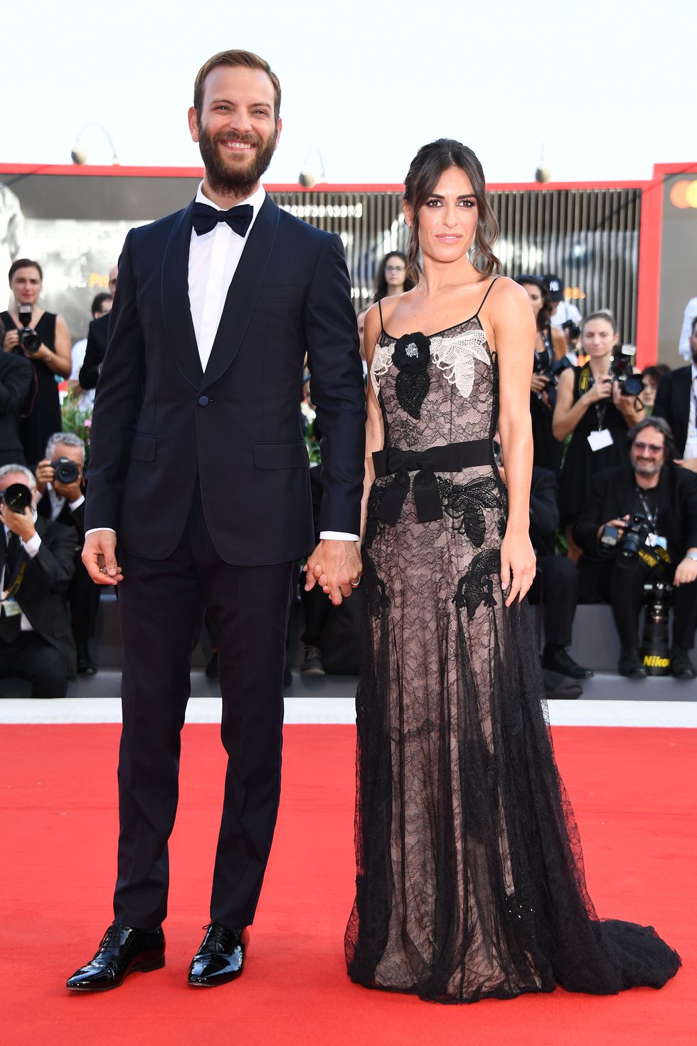 VENICE, ITALY - AUGUST 30:  Festival host Alessandro Borghi and Roberta Pitrone  walks the red carpet ahead of the 'Downsizing' screening and Opening Ceremony during the 74th Venice Film Festival at Sala Grande on August 30, 2017 in Venice, Italy.  (Photo by Pascal Le Segretain/Getty Images)