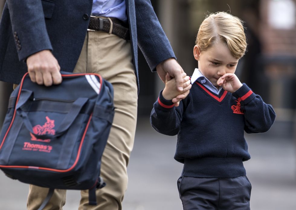 LONDON, ENGLAND - SEPTEMBER 7: (EDITORS NOTE: Retransmission of #843614132 with alternate crop.) Prince George of Cambridge arrives for his first day of school at Thomas's Battersea on September 7, 2017 in London, England. (Photo by Richard Pohle - WPA Pool/Getty Images)