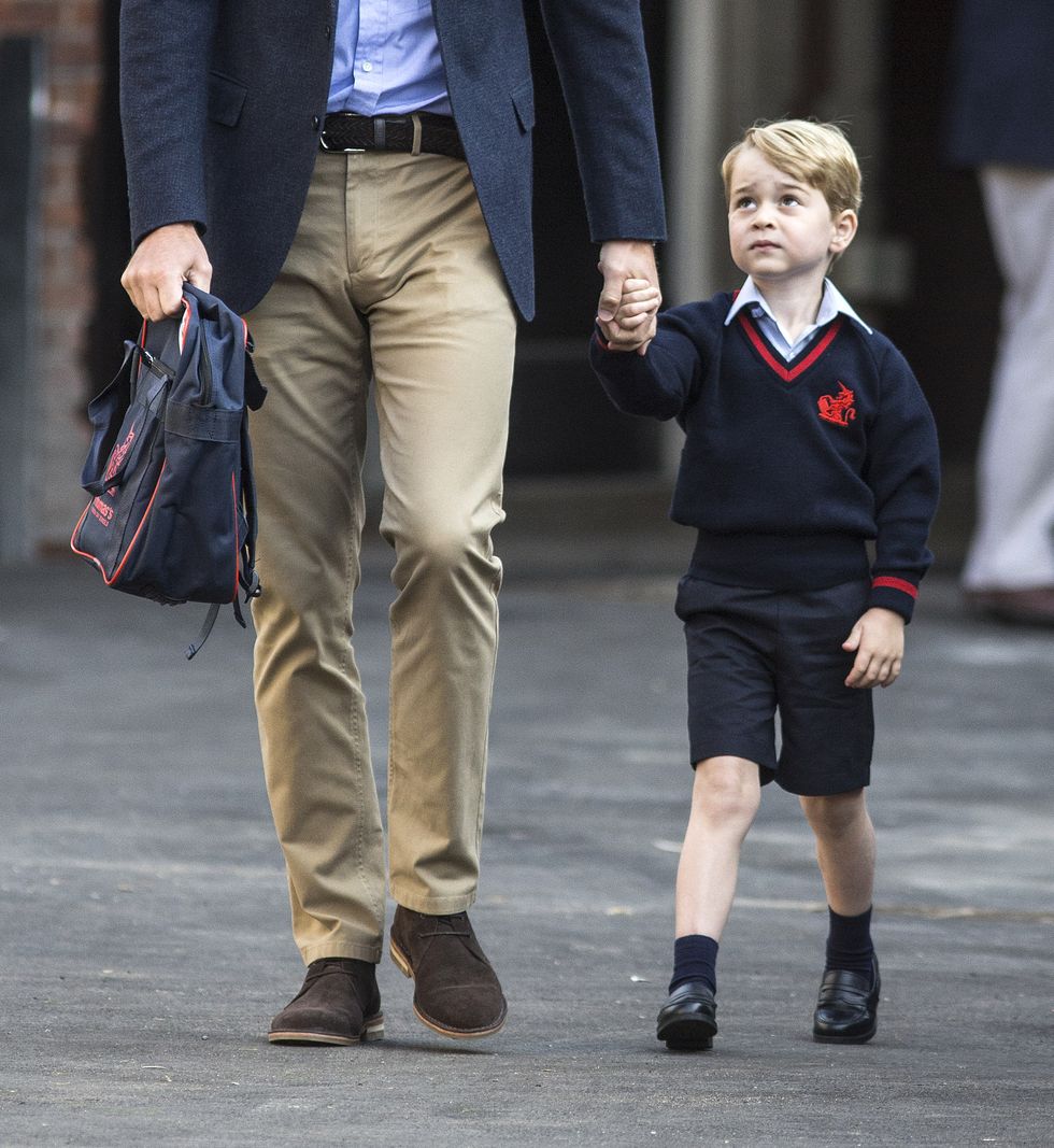 LONDON, ENGLAND - SEPTEMBER 7: Prince George of Cambridge arrives for his first day of school with his father Prince William, Duke of Cambridge at Thomas's Battersea on September 7, 2017 in London, England. (Photo by Richard Pohle - WPA Pool/Getty Images)