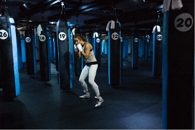 Standing, Jeans, Denim, Punching bag, Physical fitness, Banner, Active pants, Balance, 