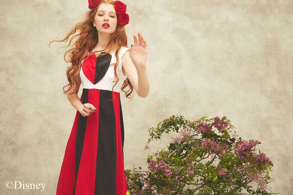 Dress, Red, Petal, Fashion accessory, Formal wear, Costume accessory, One-piece garment, Lipstick, Day dress, Red hair, 