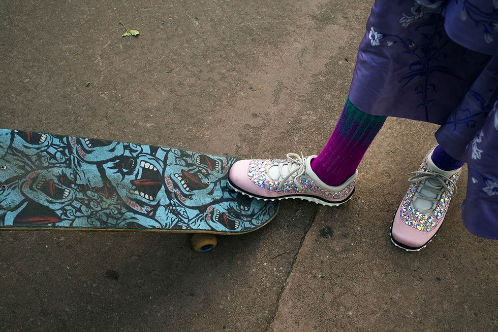 Shoe, Human leg, Purple, Lavender, Street fashion, Teal, Violet, Skateboarding Equipment, Foot, Rolling, 