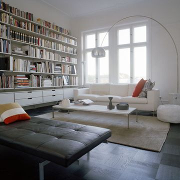 Room, Floor, Interior design, Flooring, Living room, Wall, Furniture, Shelf, Couch, Home, 