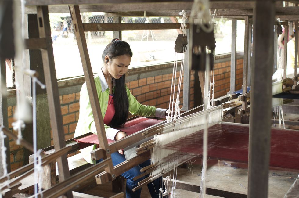Textile, Loom, Weaving, Factory, Building material, Creative arts, Steel, Craft, 
