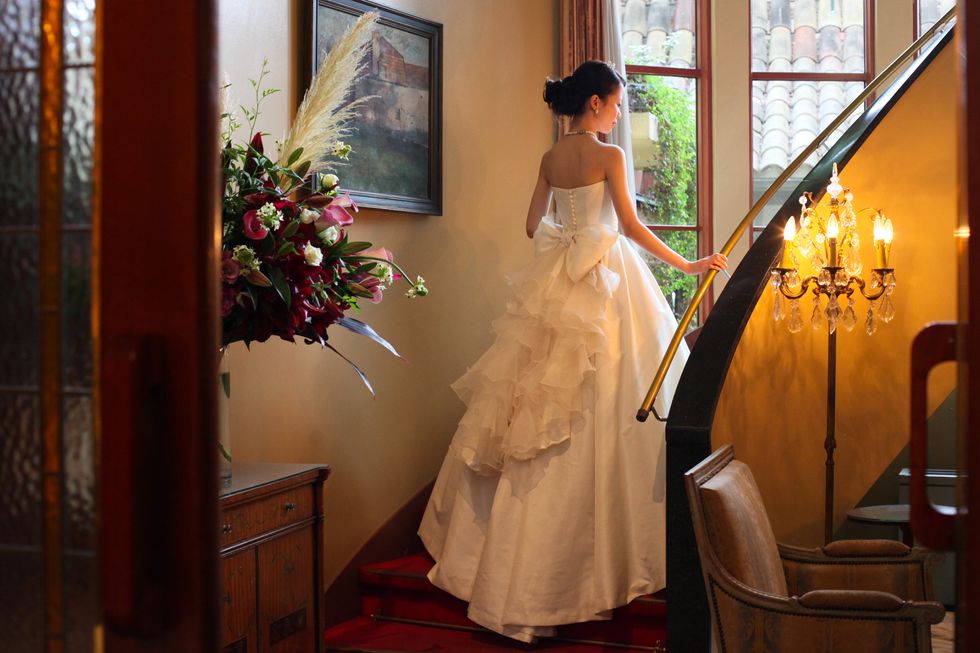 Dress, Bridal clothing, Gown, Wedding dress, Bride, Formal wear, Bridal party dress, One-piece garment, Bouquet, Waist, 
