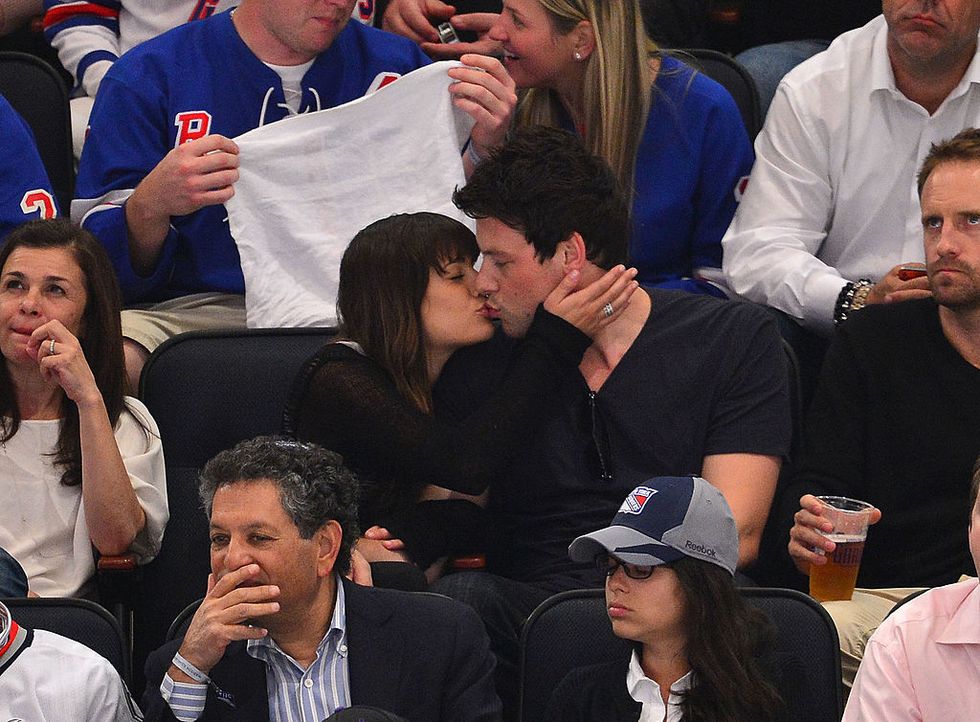 Face, Nose, Mouth, Eye, Interaction, Facial hair, Audience, Baseball cap, Beard, Fan, 