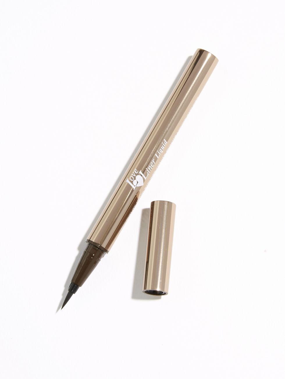 Brown, Writing implement, Stationery, Office supplies, Beige, Metal, Material property, Cosmetics, Office instrument, Pen, 