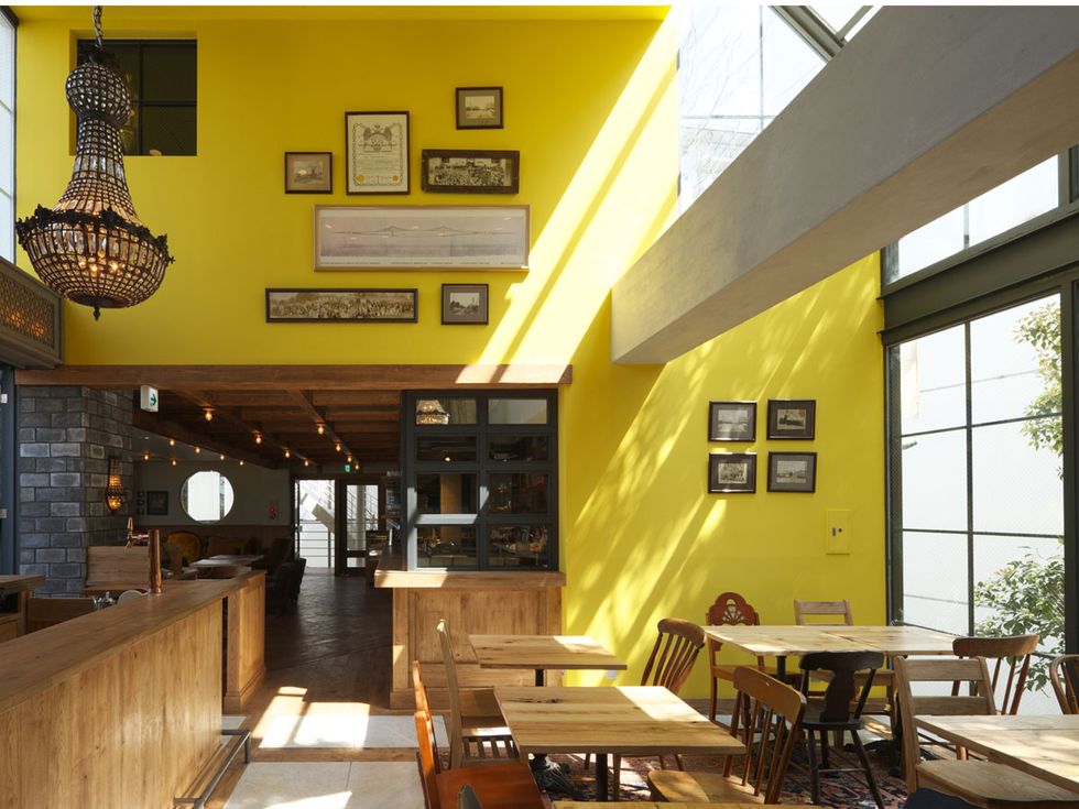 Yellow, Interior design, Room, Building, Property, Restaurant, Ceiling, Architecture, Furniture, Table, 