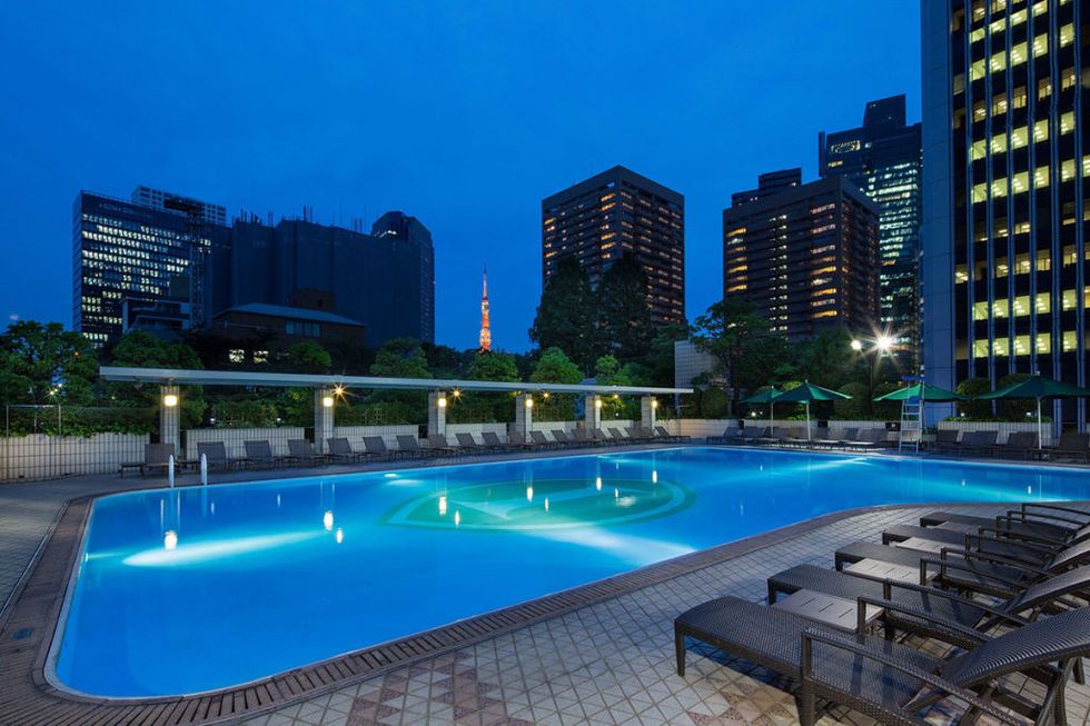 Swimming pool, Blue, Property, Condominium, Real estate, Metropolitan area, Commercial building, Building, Tower block, Mixed-use, 
