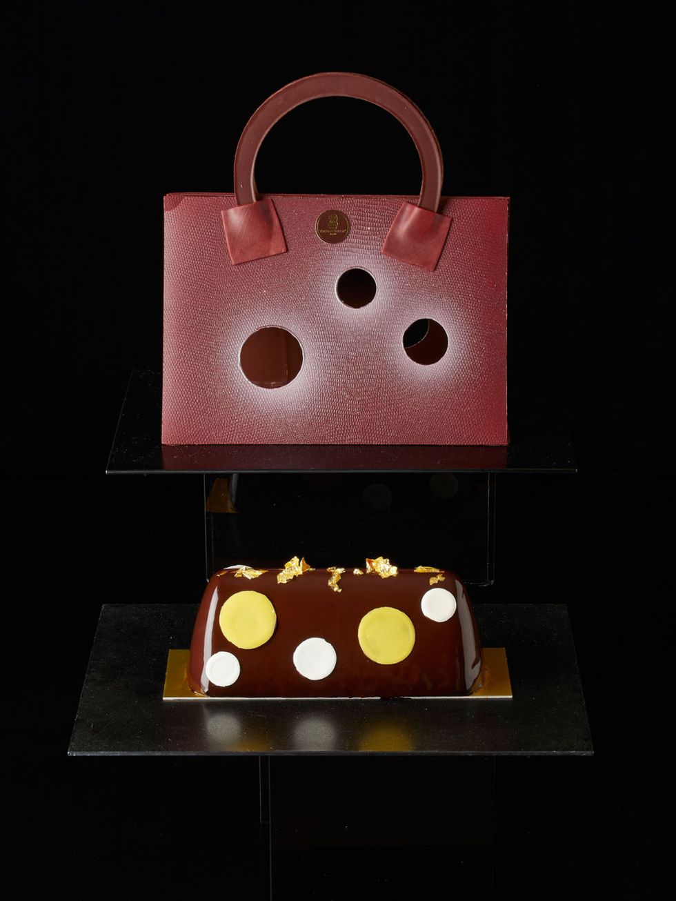 Brown, Design, Bag, Chocolate, Sweetness, Fashion accessory, Still life, Food, Handbag, Packaging and labeling, 