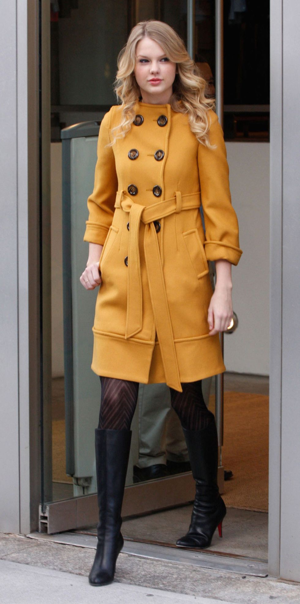 Clothing, Overcoat, Coat, Trench coat, Yellow, Outerwear, Fashion, Blond, Duster, Knee, 
