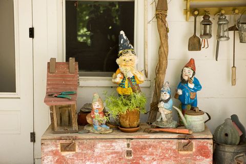 Sculpture, Toy, Lawn ornament, Flowerpot, Interior design, Door, Statue, Porcelain, Houseplant, Creative arts, 