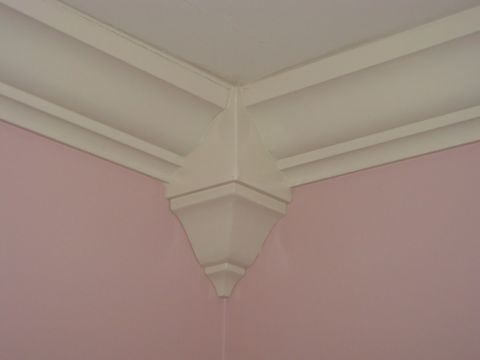 Ceiling, Wall, Molding, Beige, Material property, Plaster, Symmetry, Building material, 