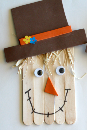 scarecrow craft made from popsicle sticks
