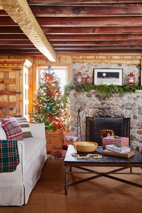 Living room, Room, Home, Interior design, Furniture, Property, Christmas decoration, Tree, Table, Fireplace, 