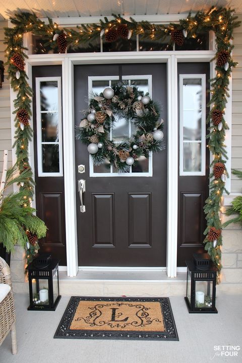 Door, Home door, Christmas decoration, Carpet, Fixture, House, Mat, Door handle, Rug, Christmas, 