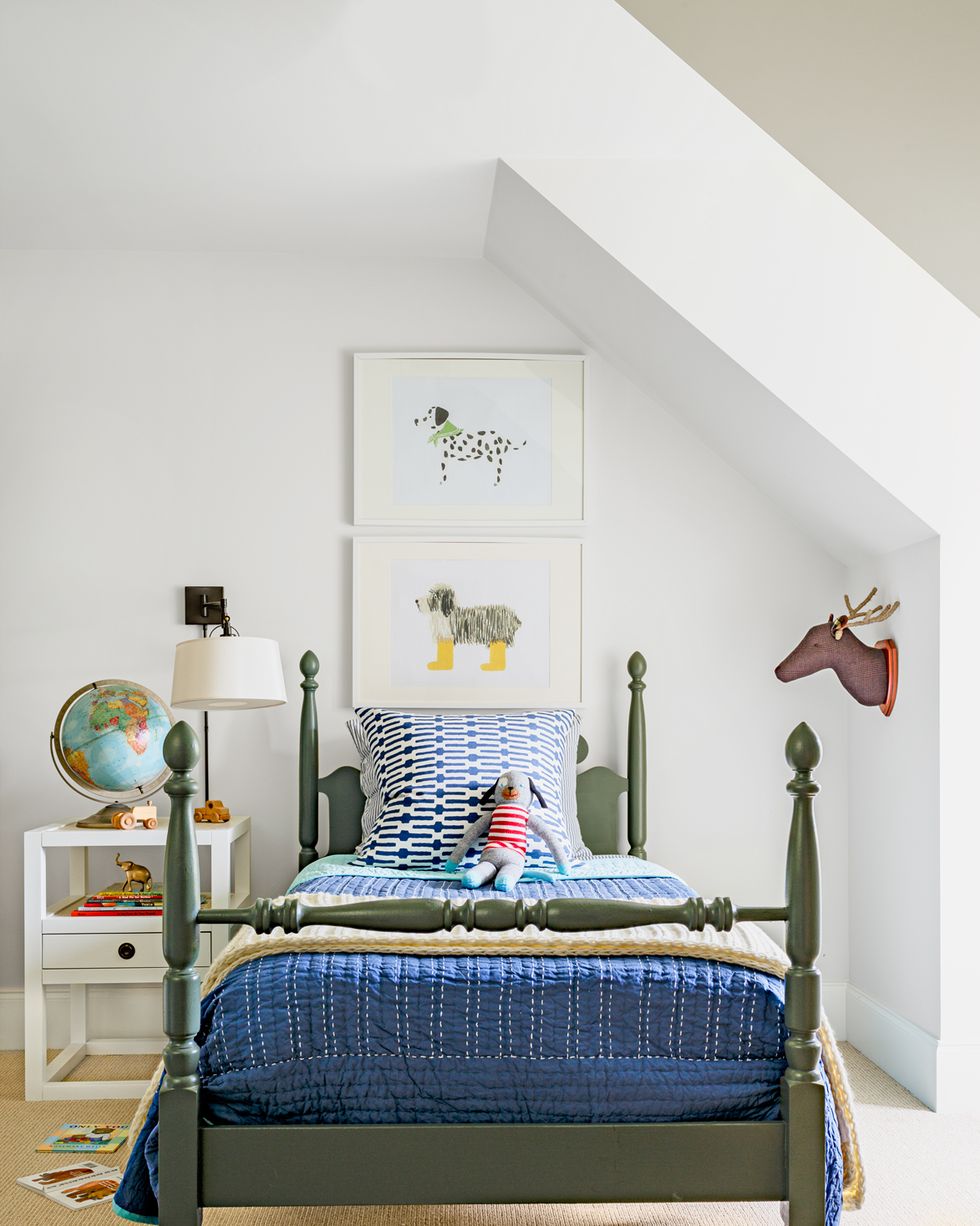 boys bedroom with green bed