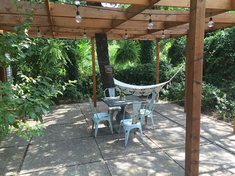 Outdoor furniture, Pergola, Shade, Outdoor table, Hardwood, Garden, Patio, Outdoor structure, Gazebo, Yard, 