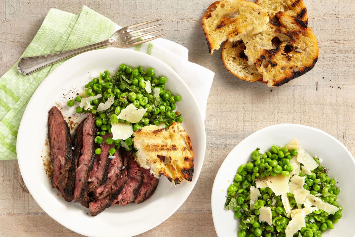 Winner dinner recipe for Grilled Cumin-Rubbed Hanger Steak with Smashed Minty Peas and Grilled Bread