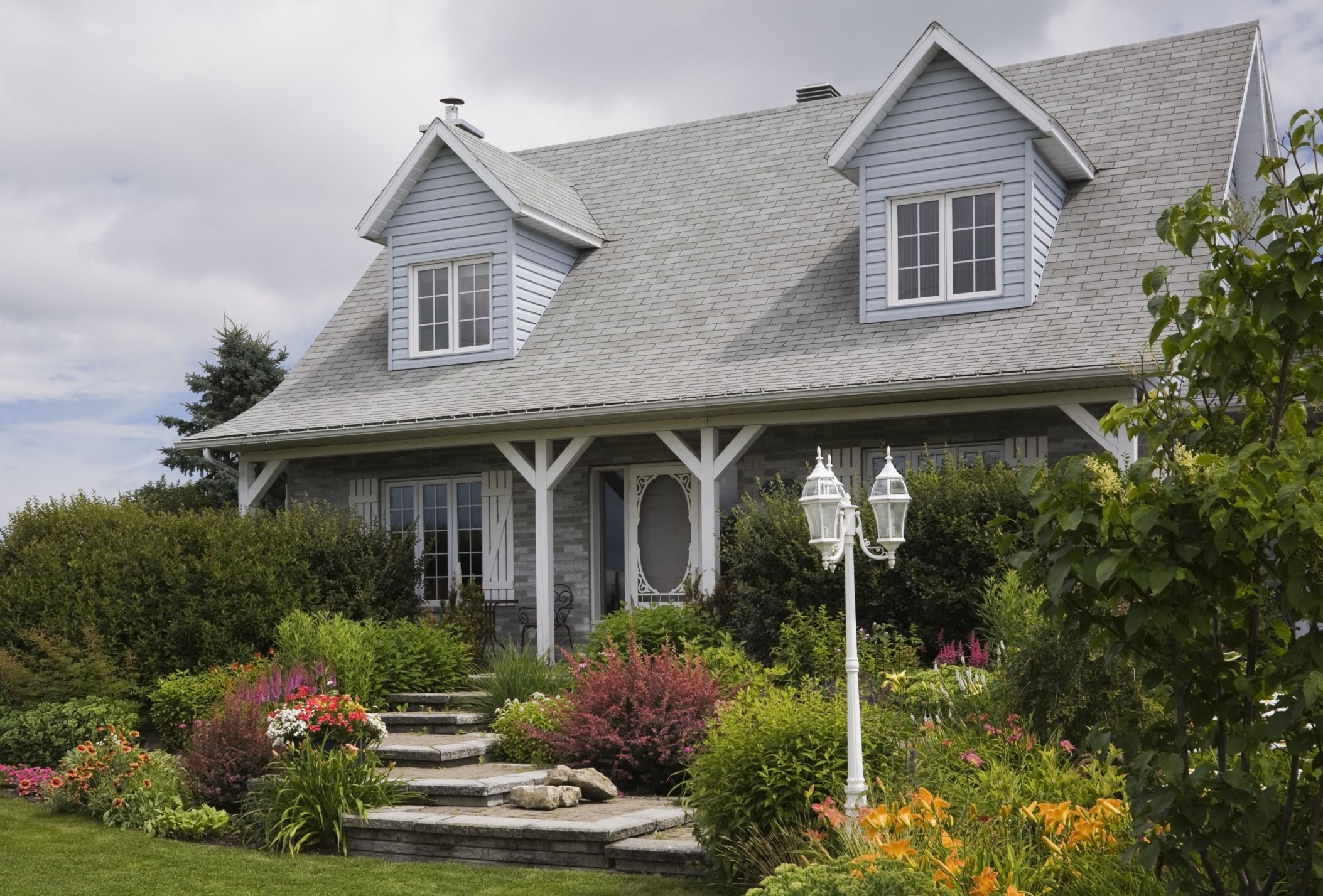 pictures of landscapes in front of houses