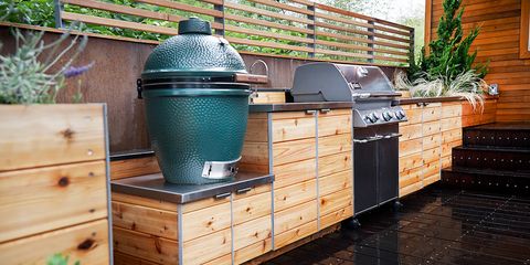 wood and metal kitchen countertop and grills in outdoor kitchen ideas