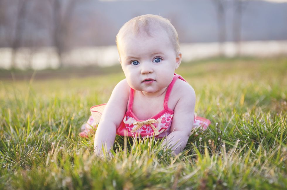 Ear, Lip, Grass, Cheek, Skin, Child, Pink, People in nature, Baby & toddler clothing, Summer, 