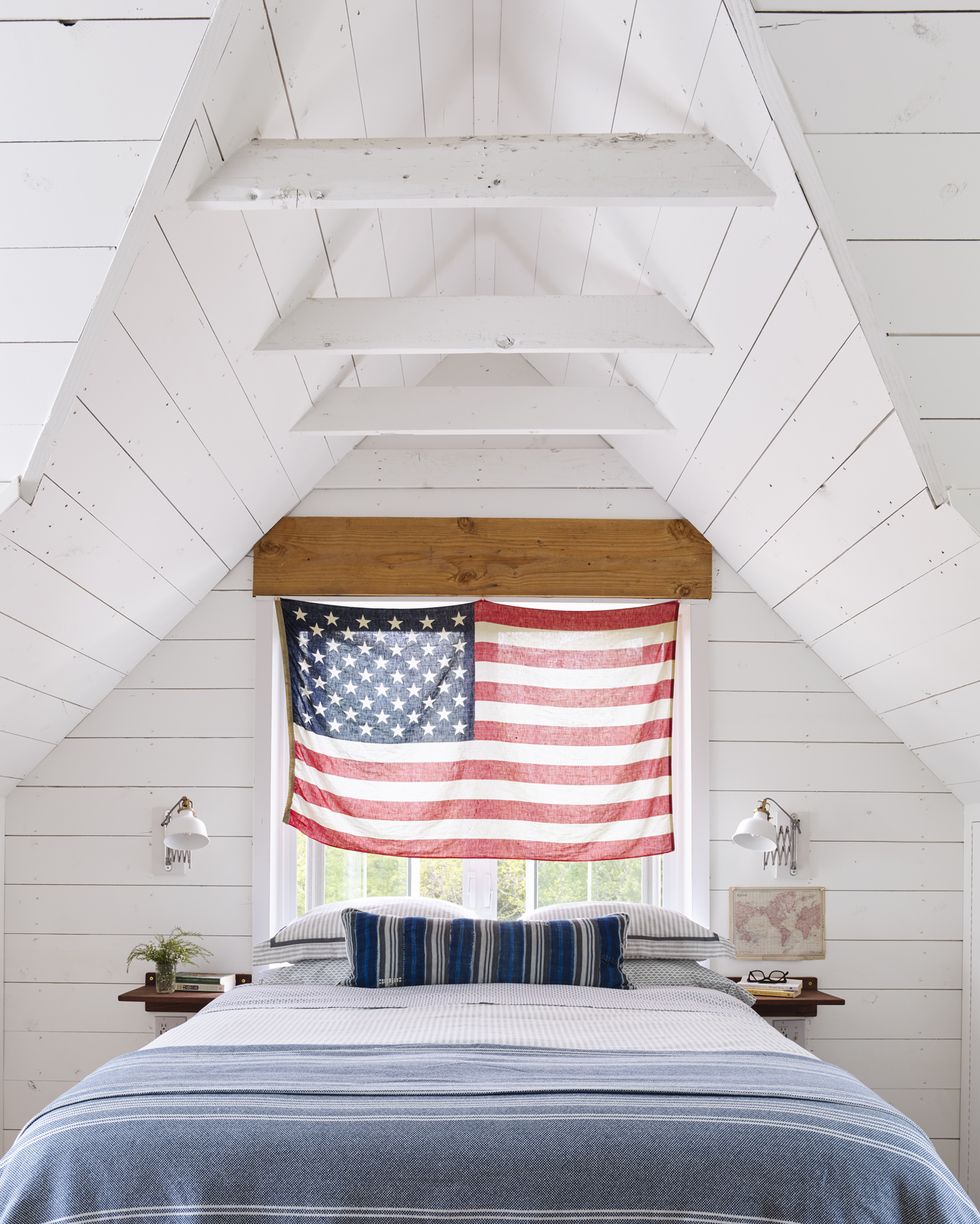 white farmhouse bedroom with american flag