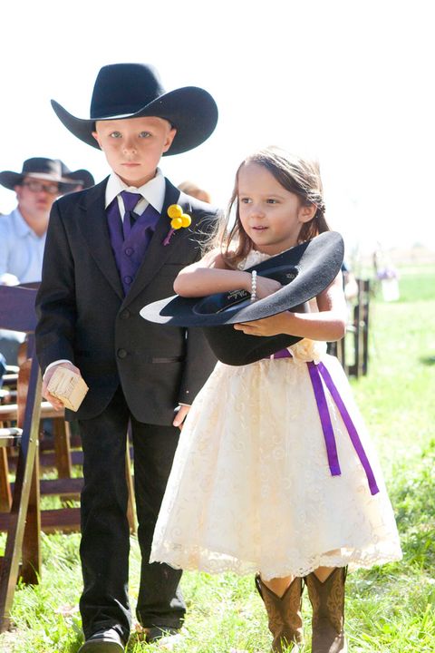 kids in cowboy hats at a wedding