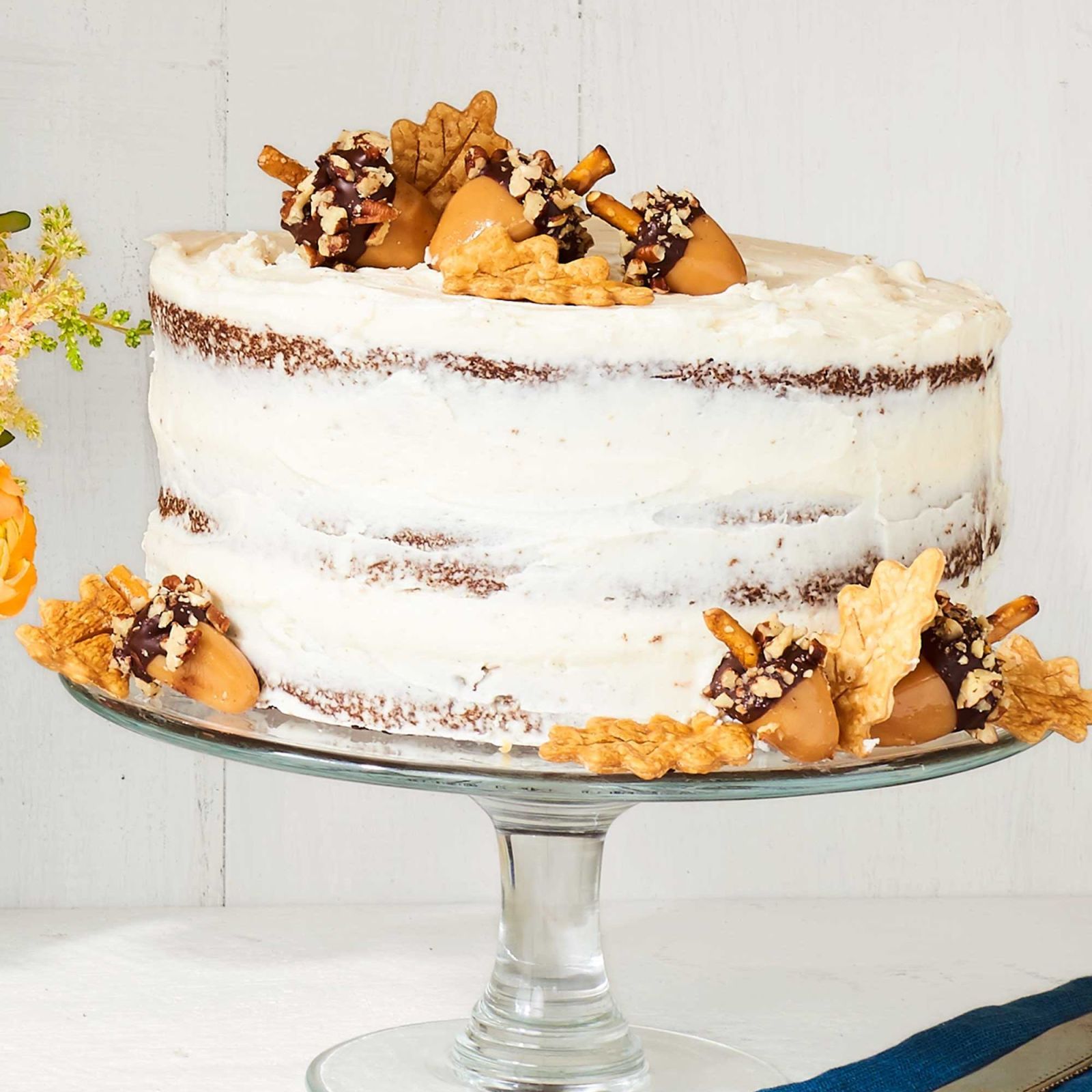 Are You Kidding Me with the Caramel Acorns and Piecrust Leaves on This Cake??