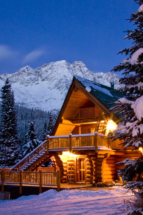 these cozy photos of log cabins in the snow will make you feel extra